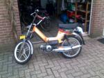 Oranje Puch uit 1986 (met kenteken) met werk