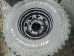5x BF Goodrich AT op Black Eight Spoke