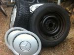 Winterbanden 175/70/14 op stalen velg + wieldoppen