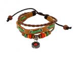 Bruine leren armband uit Tibet met kralen en bedel
